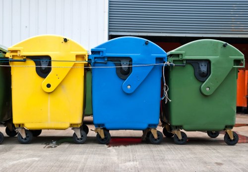 Workers managing construction waste on a clean building site